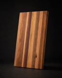 The Origin representative mixed Australian hardwood board, standing portrait studio view