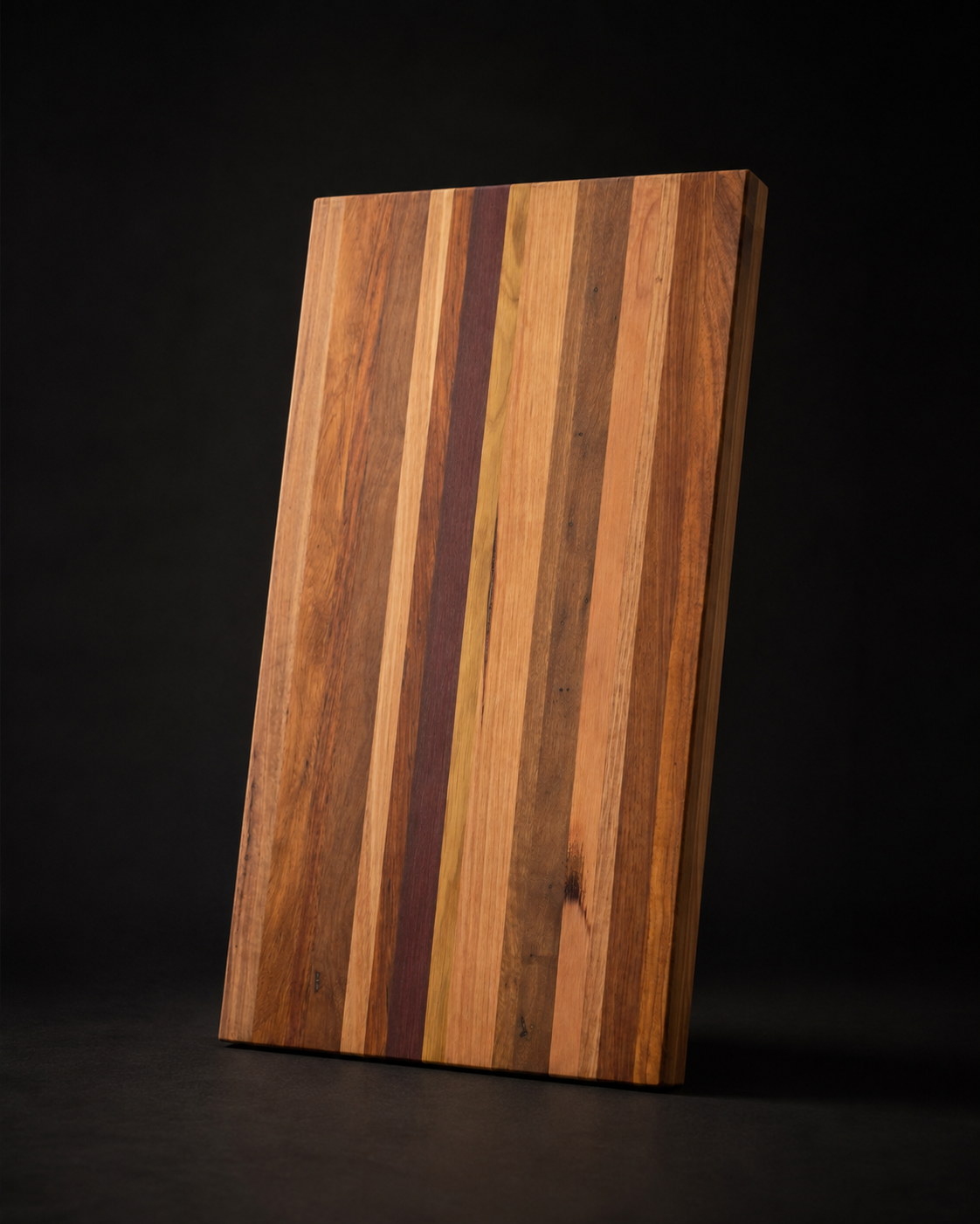 The Origin representative mixed Australian hardwood board, standing portrait studio view