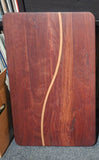 The Meander mixed Australian hardwood board with its defining S-shaped timber line