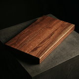 The Brook River Red Gum board on a stone plinth